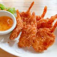 Coconut Shrimp · 6 pieces. Crispy coconut shrimp with plum sauce