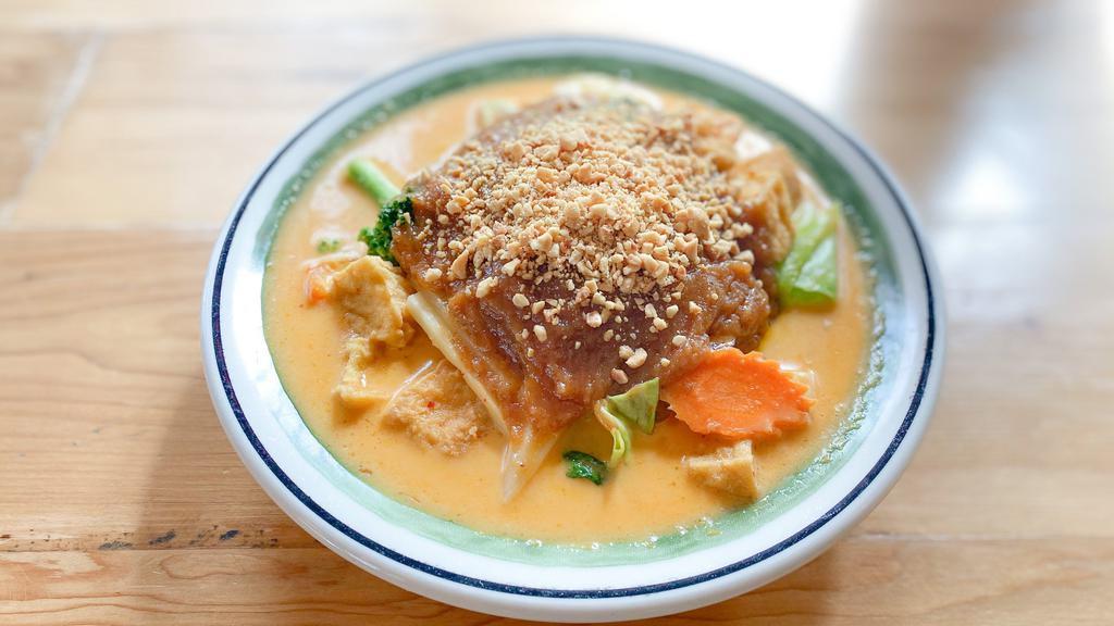 Peanut Curry (24Oz) · Red curry paste in coconut milk, eggplants, bamboo shoots, basil, bell peppers, broccoli, cabbages and carrot topped with peanut. Served with choice of rice.