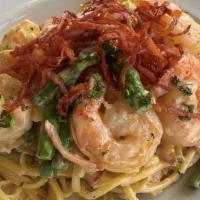 Shrimp Carbonara · Linguine pasta, asparagus, prosciutto, shallots, prawns, garlic cream, finished with egg and...