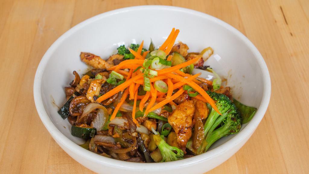 Chicken Stir-Fry · Onions, peppers, mushrooms, broccoli, zucchini, snow peas, carrots, green onions, choice of soy-ginger or coconut green curry.