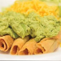 5 Rolled Tacos With Drink  · 5 rolled beef tacos (only beef) topped with cheese, guacamole and lettuce.