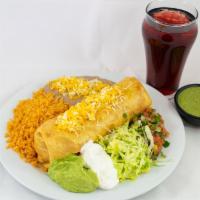Chimichanga · Fried burrito, chicken or beef, topped with Guac, Sour Cream, Cheese, Lettuce, Pico de Gallo...
