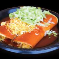 Chicken Enchiladas · two corn chicken enchiladas smothered with red enchilada sauce with lettuce and cheese on to...