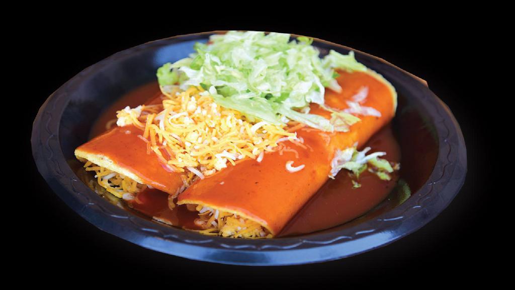 Two Cheese Enchiladas · two cheese enchiladas smothered in red enchilada sauce with cheese and lettuce on top  Served with rice and beans on the side. (corn tortilla enchiladas)