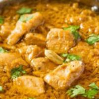 Chicken Curry Masala · Chicken stewed in an onion and tomato-based sauce and cream, flavored with fresh ginger, gar...