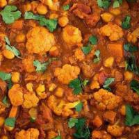 Vegetable Curry Masala · Seasonal vegetable stewed in cream with diced onions, whole peeled tomatoes, minced garlic, ...
