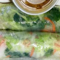 Salad Roll (2 Pieces) · Rice noodle, lettuce, mint, carrot, cilantro wrapped in fresh rice paper.