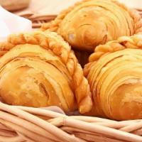 Curry Puff (3 Pieces) · It is a small pie consisting of curry with chicken and potatoes in a deep-fried or baked pas...