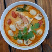 Tom Kha · Coconut milk soup with galanga root, kaffir leaves, lemongrass, onion, tomatoes, mushroom, a...