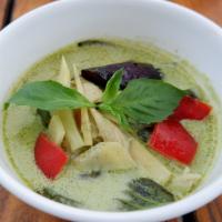 Green Curry · Green curry with coconut milk, eggplant, bamboo shoots, bell peppers and basil leaves served...
