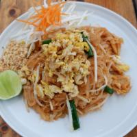 Pad Thai · Thai rice noodles stir fried with egg, bean sprouts, green onions, and ground peanut.