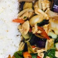 Eggplant Stir Fried · Stir fried eggplant, onions, bell peppers, and sweet basil leaves and chili paste served wit...