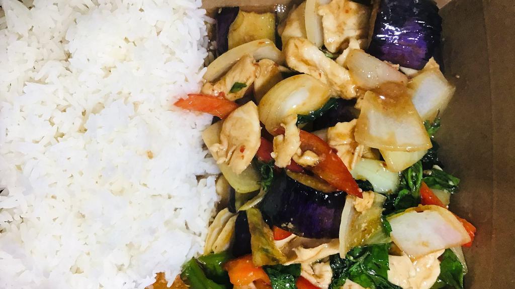 Eggplant Stir Fried · Stir fried eggplant, onions, bell peppers, and sweet basil leaves and chili paste served with rice.