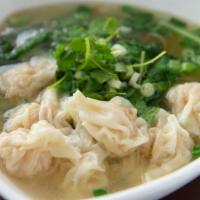 Wonton Noodle Soup · Fresh wontons stuffed with shrimp & ground chicken, egg noodles & yu choy. Topped with green...
