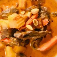 Massaman Curry  · Massaman curry paste, coconut milk, potatoes, carrots, shallots, pineapple & peanuts. Come w...