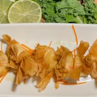 Crab Wontons · Crab mixed with cream cheese, corn in wonton wrappers and lightly fried.