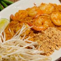 Pad Thai · Stir-fried thin rice noodle with meat, egg, and fresh bean sprouts topped with crushed peanu...