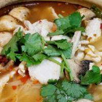 Tom Yum Noodle Soup · Rice noodles in a spicy hot and sour lemongrass broth with mushrooms, bean sprouts and fragr...