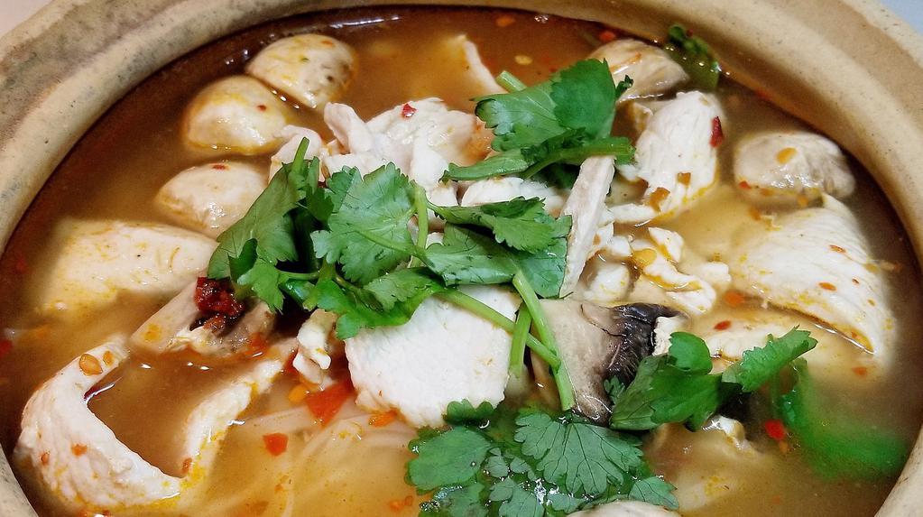 Tom Yum Noodle Soup · Rice noodles in a spicy hot and sour lemongrass broth with mushrooms, bean sprouts and fragrant Thai herbs.