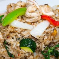 Basil Fried Rice · Jasmine rice stir fried with meat, bell peppers, onions, carrots, egg and fresh basil leaves.