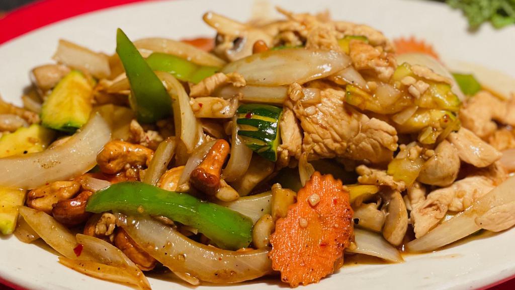 Siam Cashew Chicken · Tender chicken breast, assorted vegetables stir-fried with homemade chili paste and roasted cashews.