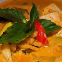 Red Curried · Spicy red curry paste in coconut milk, meat, bamboo shoots, zucchini, bell pepper and sweet ...