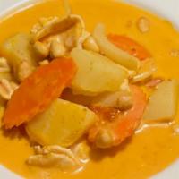 Massaman Curry · Meat slow cooked with potatoes, onion, in a rich massaman curry paste mixed with coconut mil...