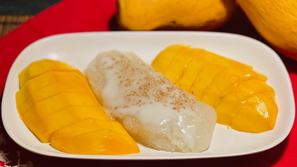 Sweet Mango With Coconut Milk Sticky Rice · (Seasonal) Fresh, ripe mango served with sweet sticky rice, drizzled with coconut milk.