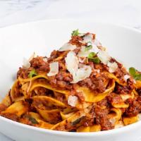 Pappardelle Bolognese · San marzano, pancetta, and red wine.