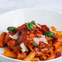 Penne Alla Vodka · Piquillo peppers and fresh basil.