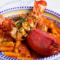 Lobster Fra’ Diavolo · Spicy cherry pepper and lobster cream sauce.
