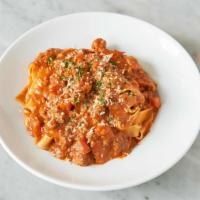Pappardelle Bolognese · Old world classic sauce of ground beef, veal, and pork, aromatic vegetables, red wine, tomat...
