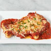 Chicken Parmesan · Breaded and pan-fried tender boneless chicken breast, topped with Mozzarella cheese and plum...