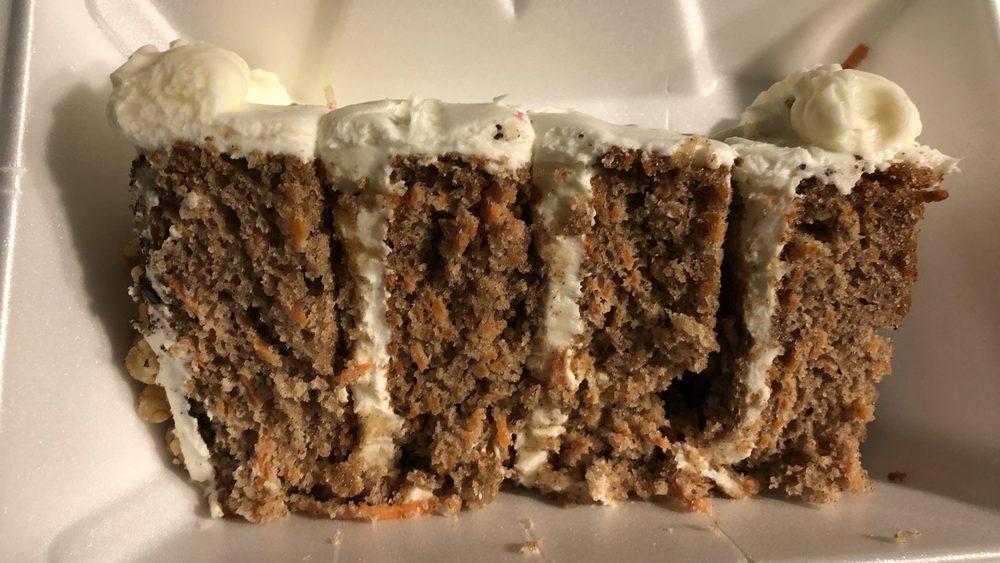 Carrot Cake · Carrot Cake iced and filled with whipped cream cheese icing and topped with walnuts.  Perfect for someone that is looking for a lightly sweetened cake.