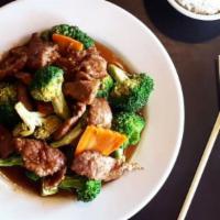 Broccoli With Beef · Sliced flank steak tossed with broccoli and carrots.