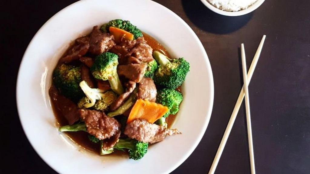 Broccoli With Beef · Sliced flank steak tossed with broccoli and carrots.