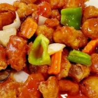 Sweet & Sour Pork · Pineapple, bell peppers, and onions with pork in our sweet and sour sauce.