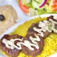 Kofta Plate · Sizzling pieces of extra lean. Ground beef minced with onion, parsley over basmati rice, hum...