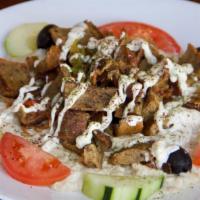 Babaganoush Plate · Babaganoush (roasted eggplant mixed with tahini) topped with your choice of beef & lamb gyro...