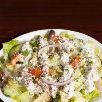 Greek Salad · Romaine lettuce, tomatoes, cucumber, Feta cheese, red onion, olives, pepperoncini with Itali...