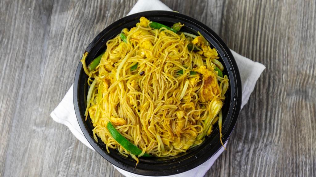 Singapore Bowl · Rice noodle woked tossed with choice of protein, yellow onion, green onion, bean sprouts, green pepper in a tasty made in house mild curry sauce