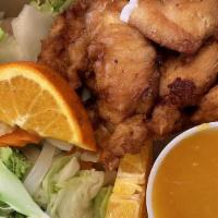 Orange Chicken · Battered chicken and soak with house made orange sauce. Served with mix steam vegetables
