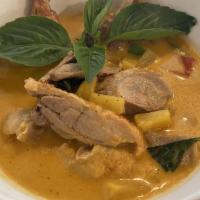Ducky Curry · Roasted duck in red curry, pineapple, bell pepper, tomatoes and basil leaves
