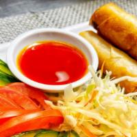 Thai Egg Rolls · Three pieces: chicken, cabbage, carrot, onion and bean noodles.