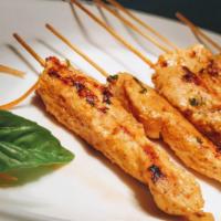 Chicken Satay · Four pieces. Grilled marinated chicken with peanut sauce.