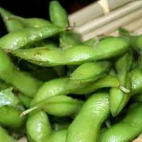 Edamame · Salted green soy bean pods and home made spicy sauce.