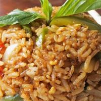 Basil Fried Rice Dinner · choice of meat, Egg, bell pepper, onion, carrot, green onion and basil .