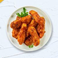 Bbq Buster Tenders · Chicken tenders cooked crispy and tossed with barbecue sauce. Served with choice of ranch or...