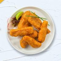 Habanero Hots Tenders · Chicken tenders cooked crispy and tossed with mango habanero sauce. Served with choice of ra...