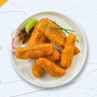 Sweet N' Spice Tenders · Chicken tenders cooked crispy and tossed with sweet chili sauce. Served with choice of ranch...